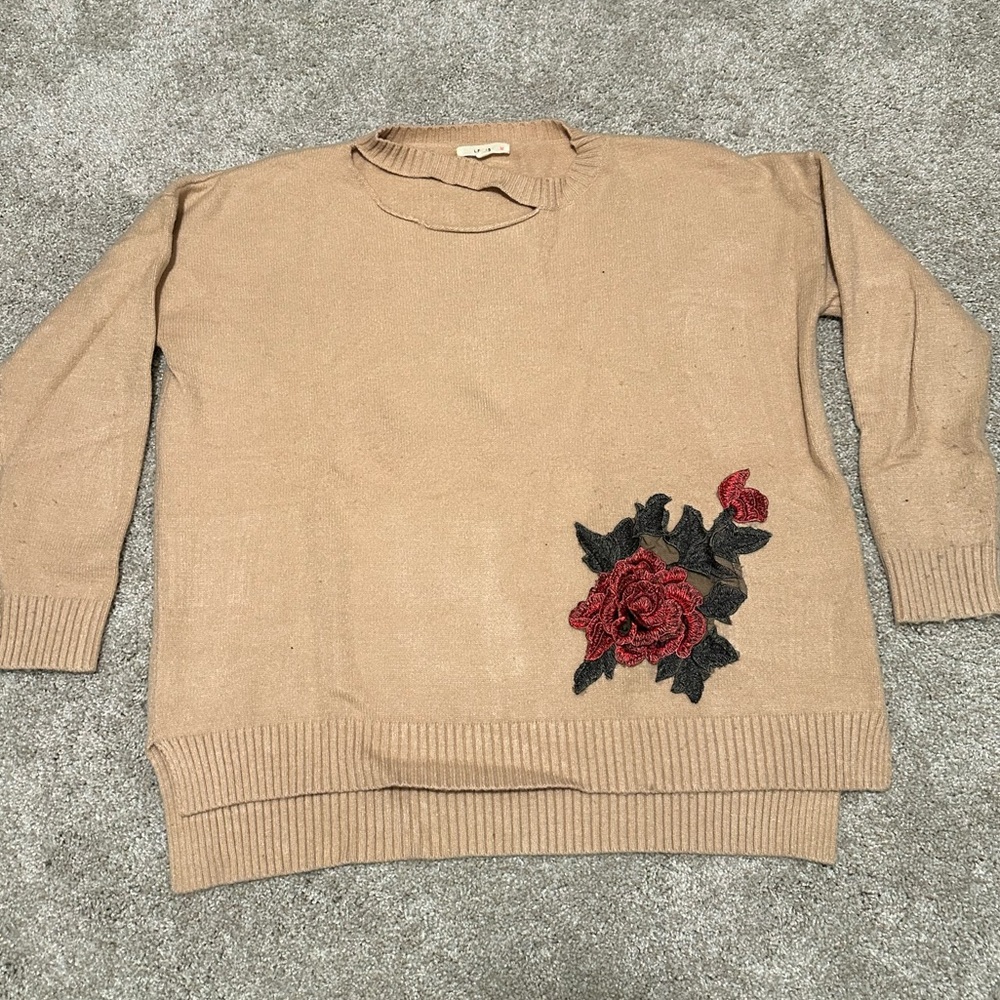 Cream ripped neck sweater with Rose detail